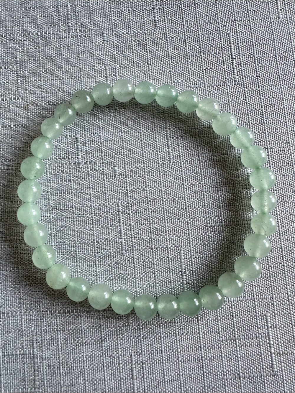 Jade EUC green beaded stretch bracelet. Appx. 6mm beads of genuine gemstone.